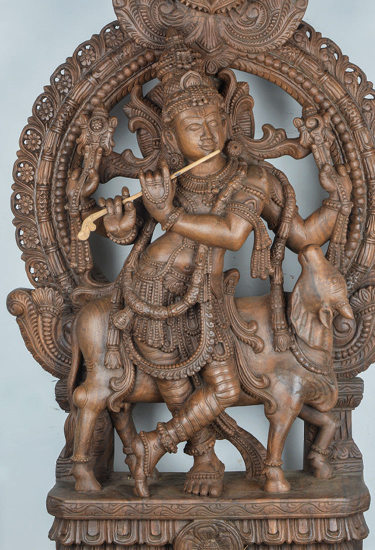 wood krishna statue