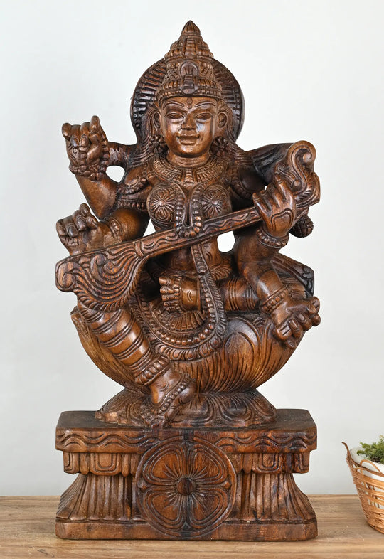 Saraswati playing the Veena with four arms 24"