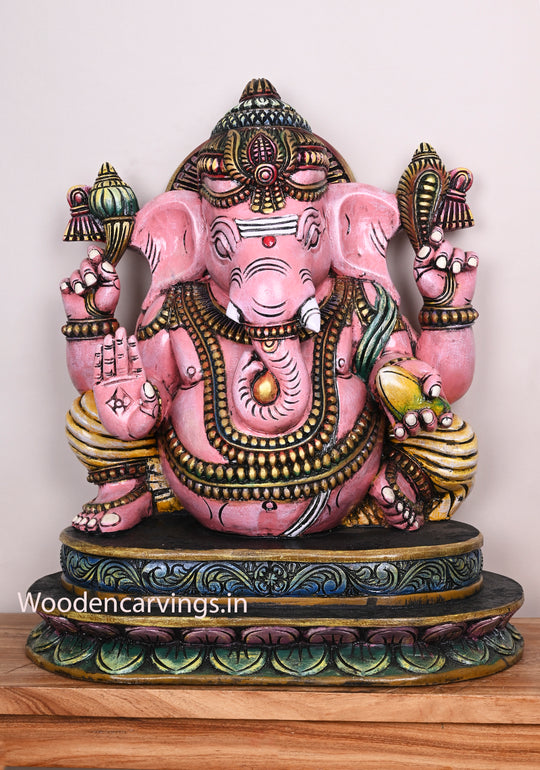 Beautiful Pink Ganapathi Differently Seated On Base and Holding Mango Multicoloured Wooden Sculpture 28"