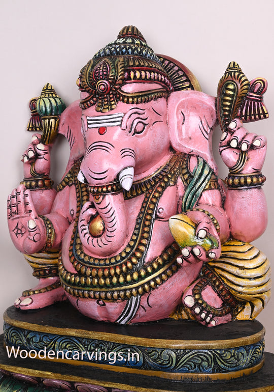 Beautiful Pink Ganapathi Differently Seated On Base and Holding Mango Multicoloured Wooden Sculpture 28"