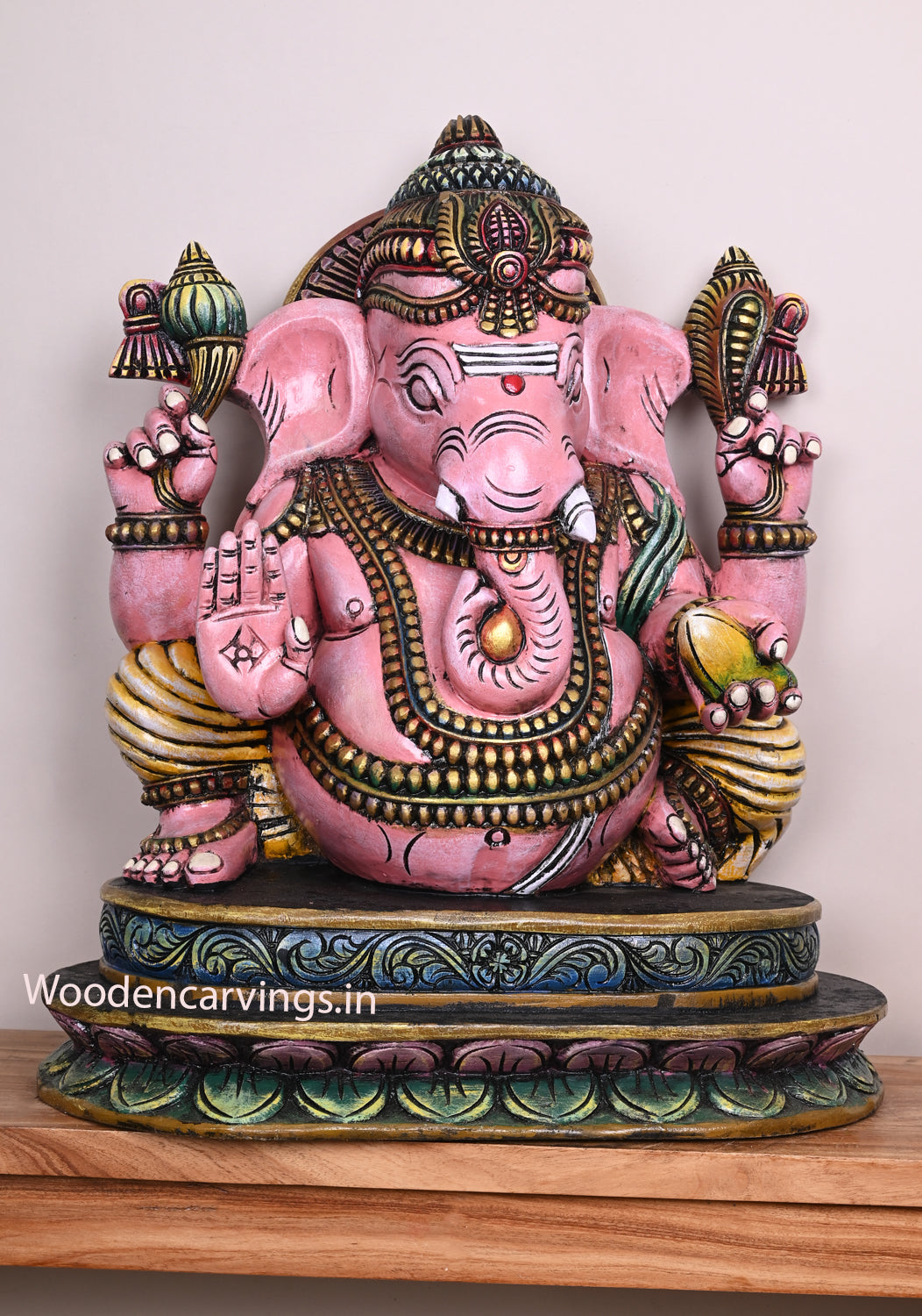 Beautiful Pink Ganapathi Differently Seated On Base and Holding Mango Multicoloured Wooden Sculpture 28"