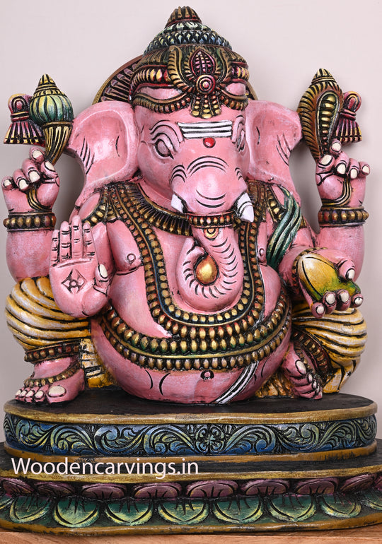 Beautiful Pink Ganapathi Differently Seated On Base and Holding Mango Multicoloured Wooden Sculpture 28"