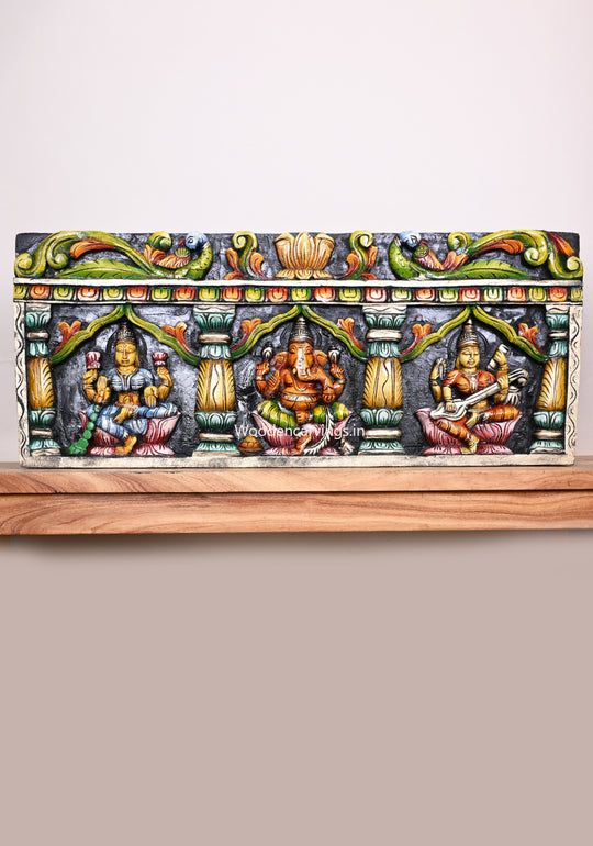 Wooden Pillar Design Square Shaped Ganesha, Lakshmi, Saraswathi Horizontal Multicoloured Wooden Wall Panel 36"