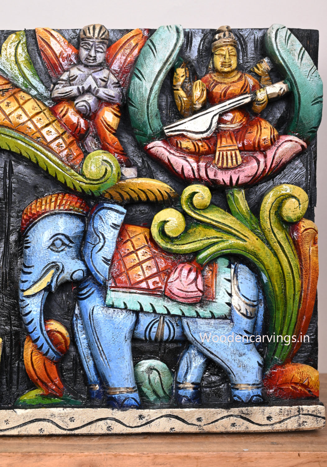 Wooden Petal Design Decorative Ganesh, Lakshmi, Saraswathi With Blue Elephants Multicoloured Wooden Wall Panel 36"