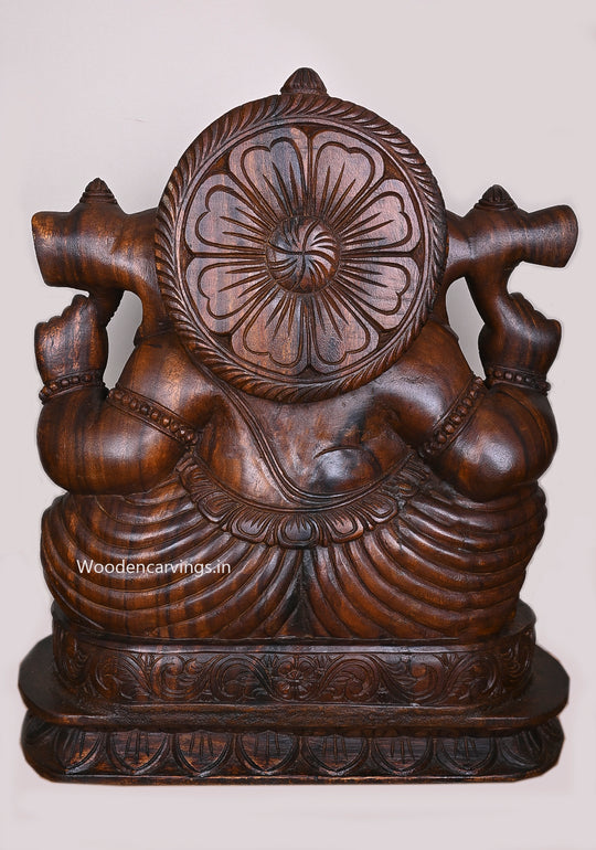 Shree Lambodara Lord Ganesh Seated on Base In Blessing Gesture Wooden Wax Brown Sculpture 27"