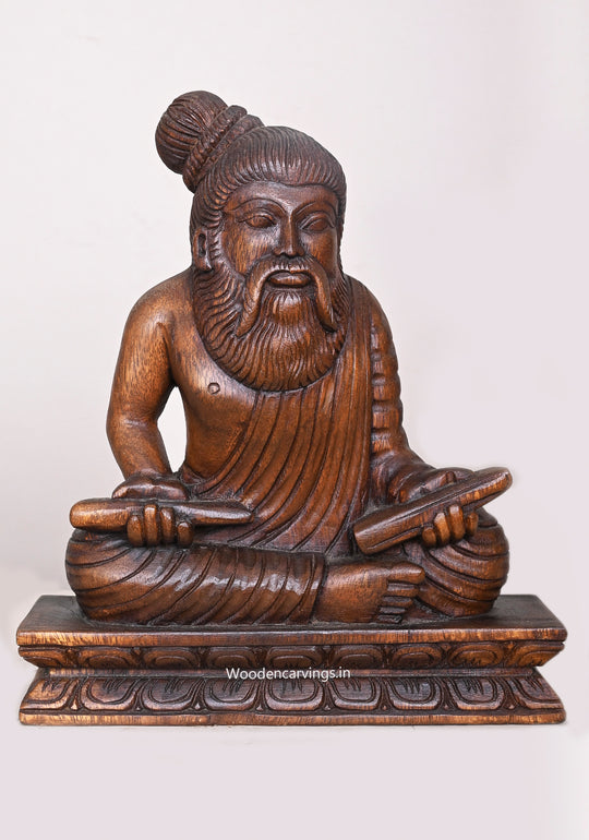 Dheivappulavar Thiruvalluvar Holding Olaichuvadi Wooden Handcrafted Showpiece Wax Brown Sculpture 11.5"