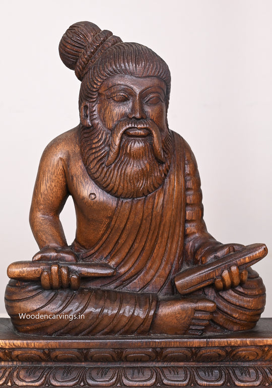 Dheivappulavar Thiruvalluvar Holding Olaichuvadi Wooden Handcrafted Showpiece Wax Brown Sculpture 11.5"