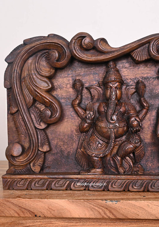 Carved Three Unique Forms of Lord Ganapathy With Sevagars Holding Jack Fruit Wax Brown Wooden Wall Panel 36"