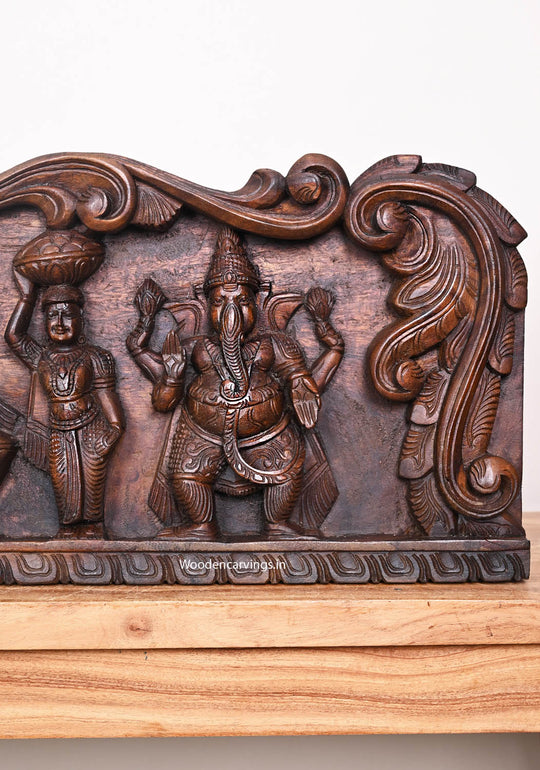 Carved Three Unique Forms of Lord Ganapathy With Sevagars Holding Jack Fruit Wax Brown Wooden Wall Panel 36"