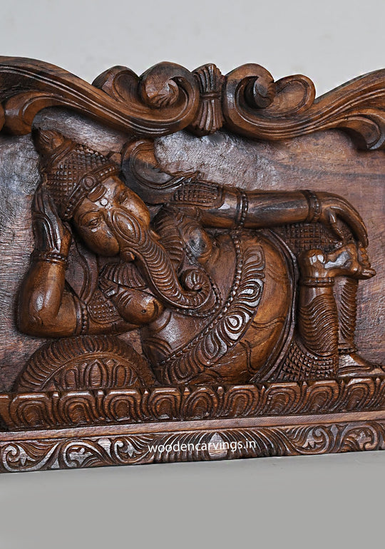 Wooden Lucky Prosperity Reclining Lord Ganapathy on Pillow Handcrafted Floral Design Wax Brown Finishing Wall Panel 18"