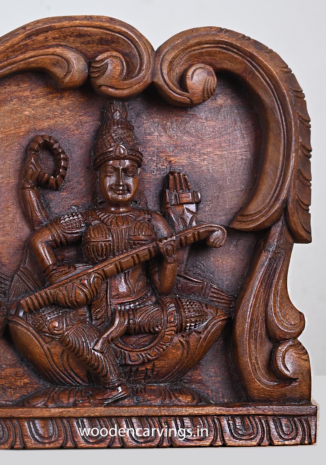 Floral Arch Wooden Ganesha Murti, Saraswati & Lakshmi Wall Panel 24"