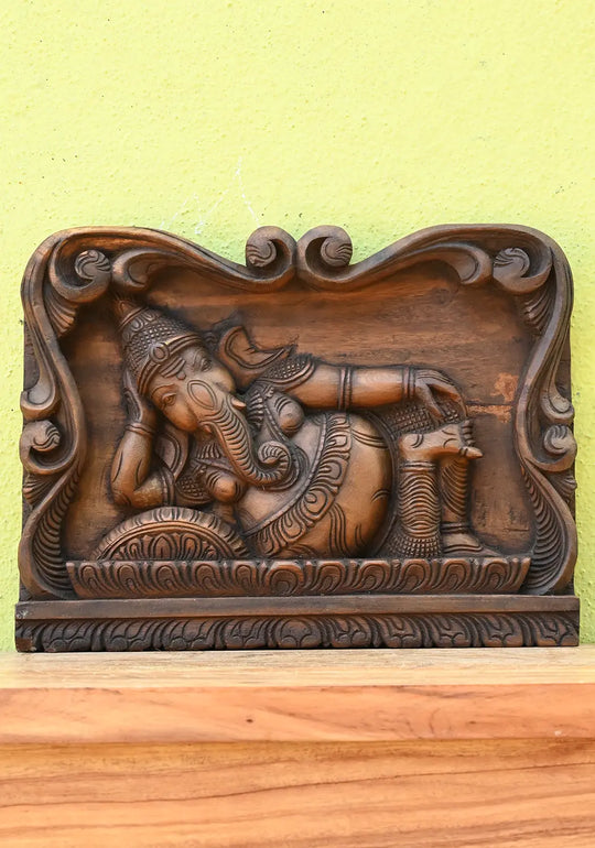 Wooden Wall Hanging of A Ganesha Murti in A Relaxed Posture