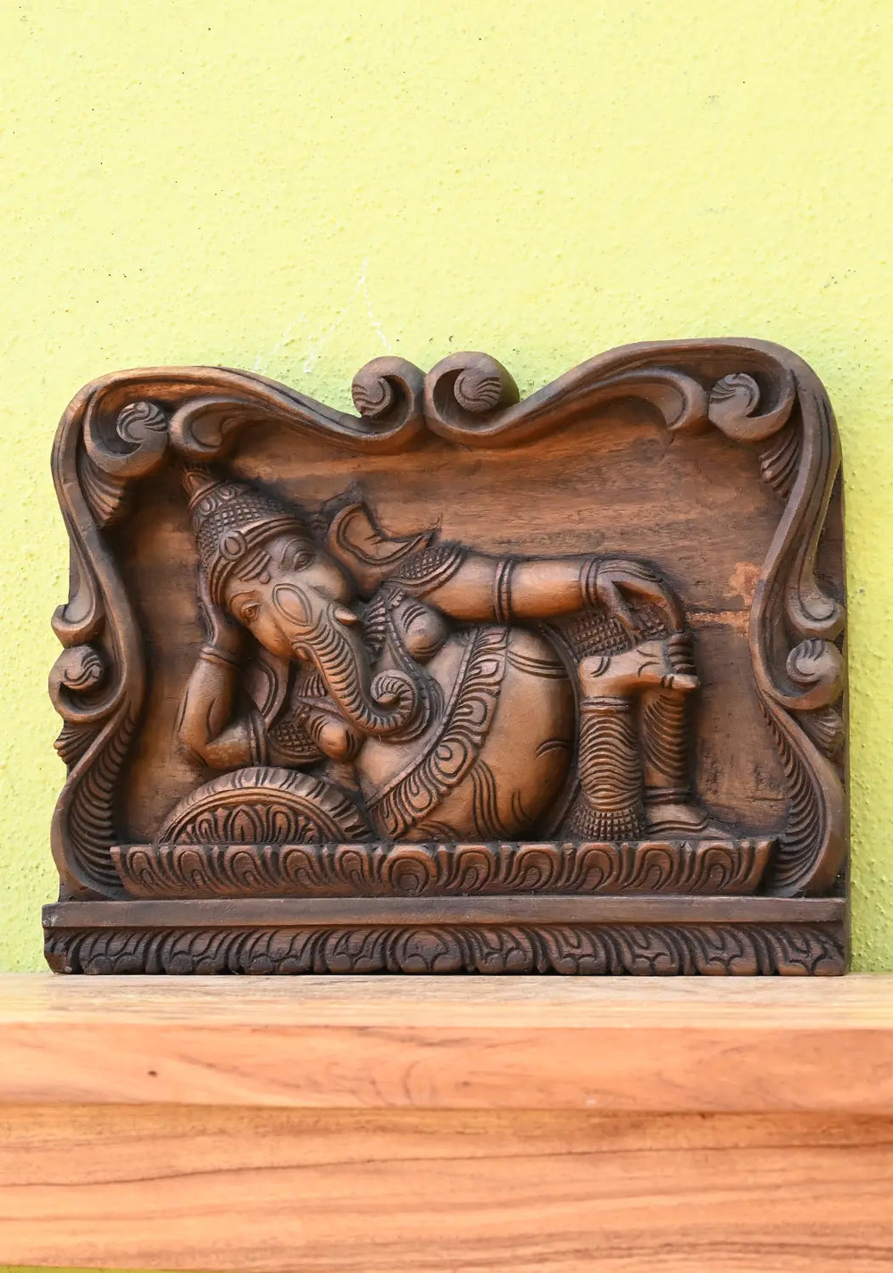 Wooden Wall Hanging of A Ganesha Murti in A Relaxed Posture