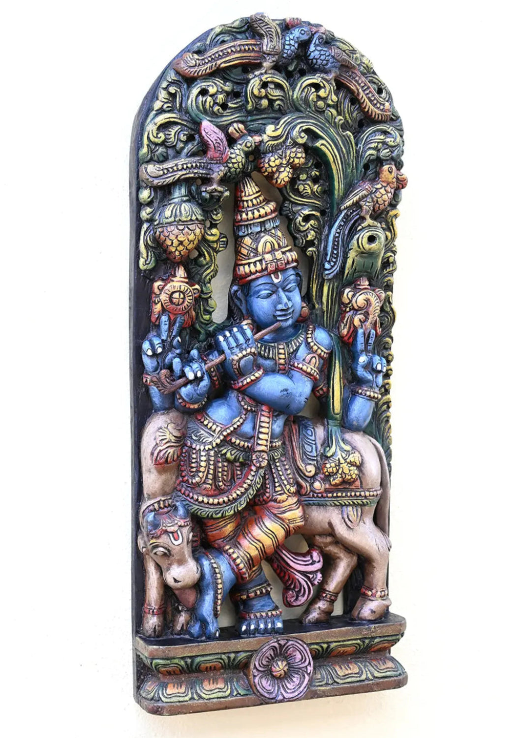 wooden Krishna statue